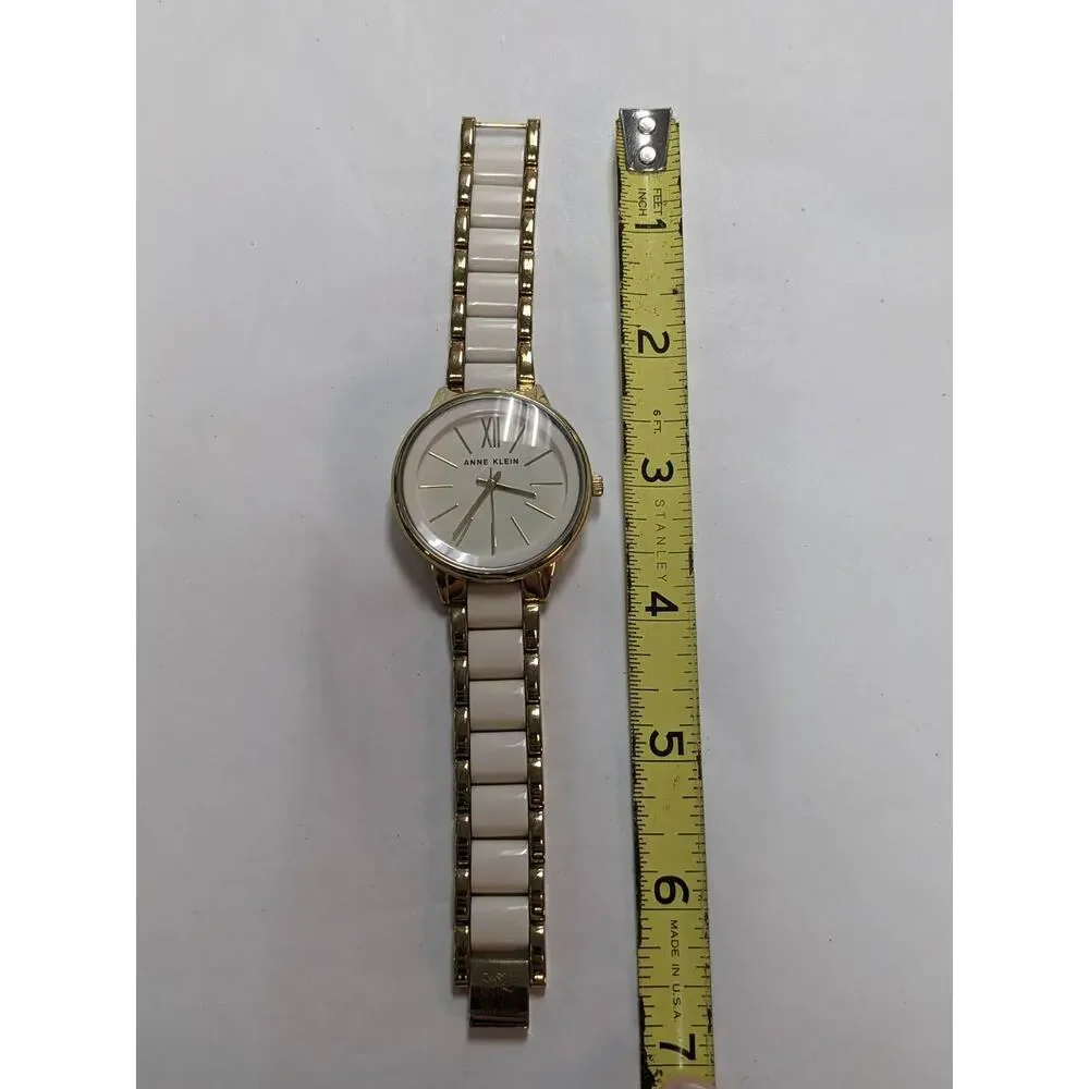 Anne Klein Two Tone White and Golden Sectioned Wrist Watch Roman Numeral